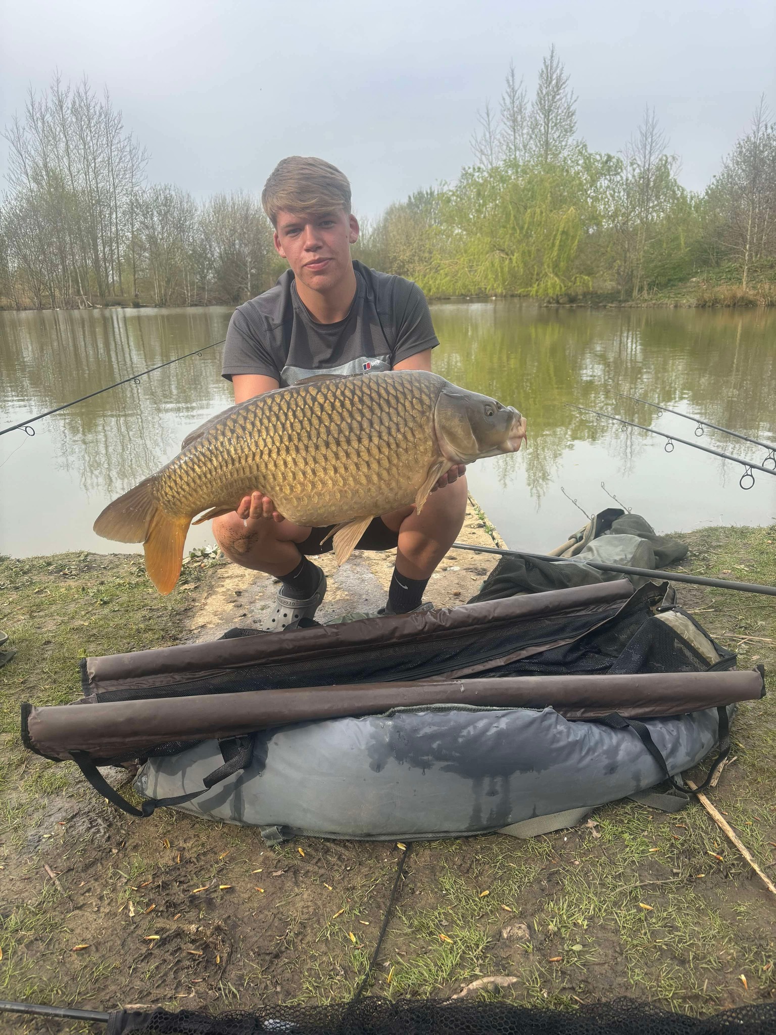 Jordon holding a 27lb 8oz common carp at Alderwood Fishery