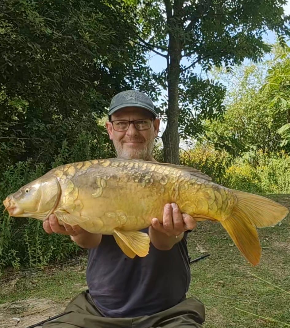 Dave with a carp caught at Alderwood Fishery